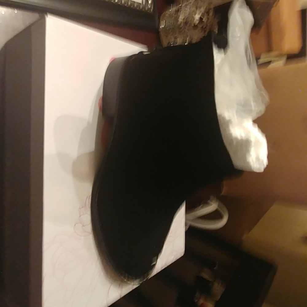 Cute black open toed booties.